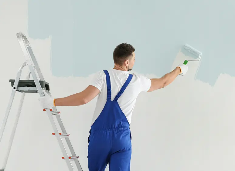 Home renovation with paint roller