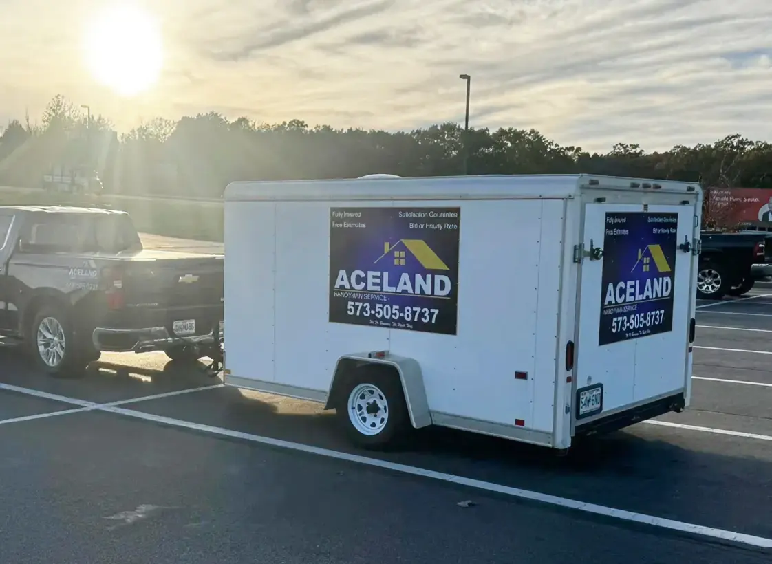 White trailer attached to black truck.